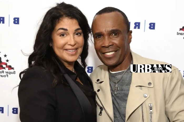 Bernadette Robi, wife of Sugar Ray Leonard, smiling at a charity event, showcasing her style and grace.