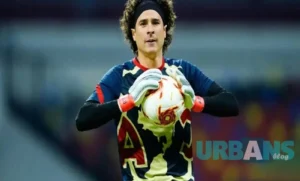 Guillermo Ochoa net worth 2024 - Mexican goalkeeper making spectacular save in national team jersey