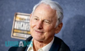 Victor Garber net worth 2024 - Award-winning actor in suit at red carpet event