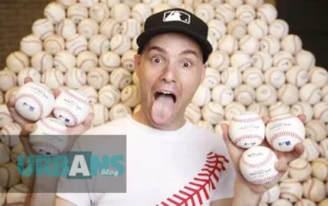 Zack Hample displaying his extensive baseball collection while discussing his net worth and successful career as a professional ball hawk