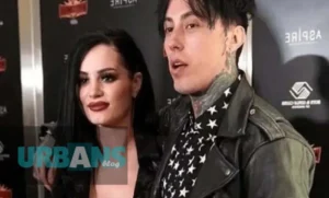 Ronnie Radke and wife Caroline Burt attending a red carpet event together, showcasing their relationship as a power couple in the alternative rock scene