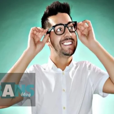 John Crist performing stand-up comedy on stage - Christian comedian's net worth and career success in 2025